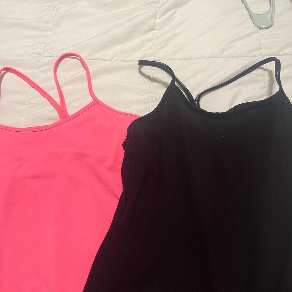 Two pack Lululemon racer back tank tops. Only worn a few times great condition.